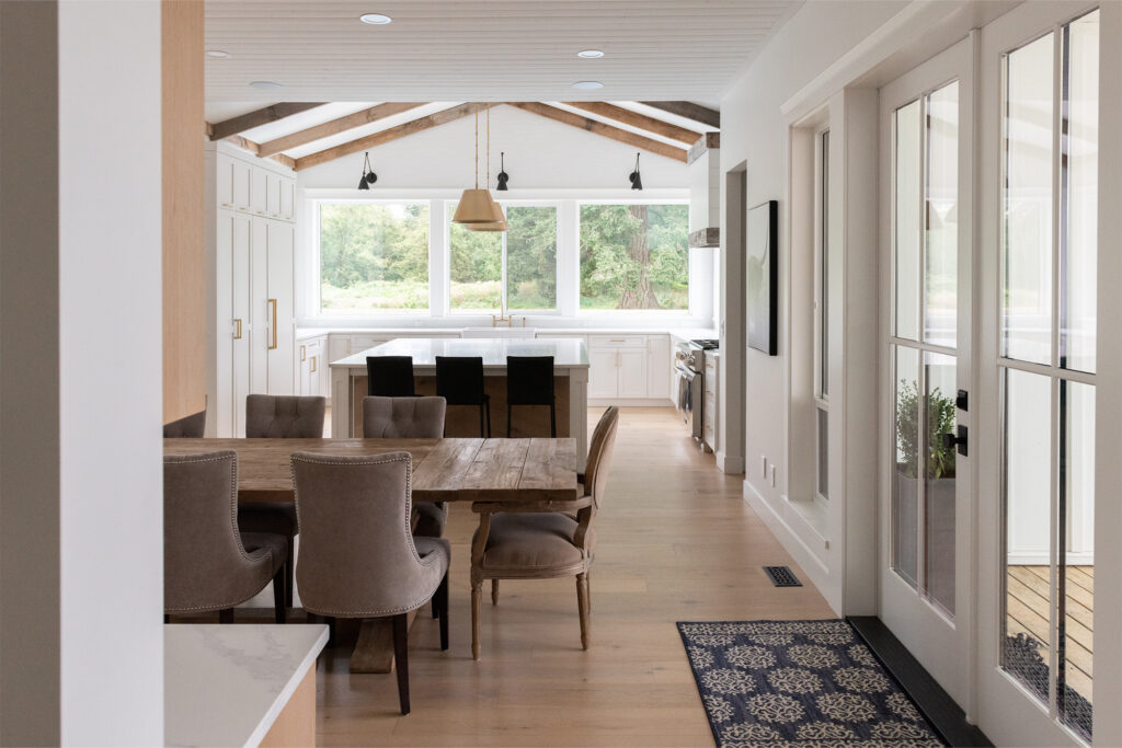 Laminate Flooring in a living dining setting by Carpet to Go